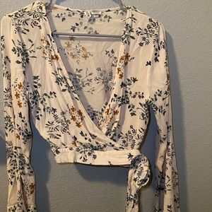 Floral bell sleeve wrap top
